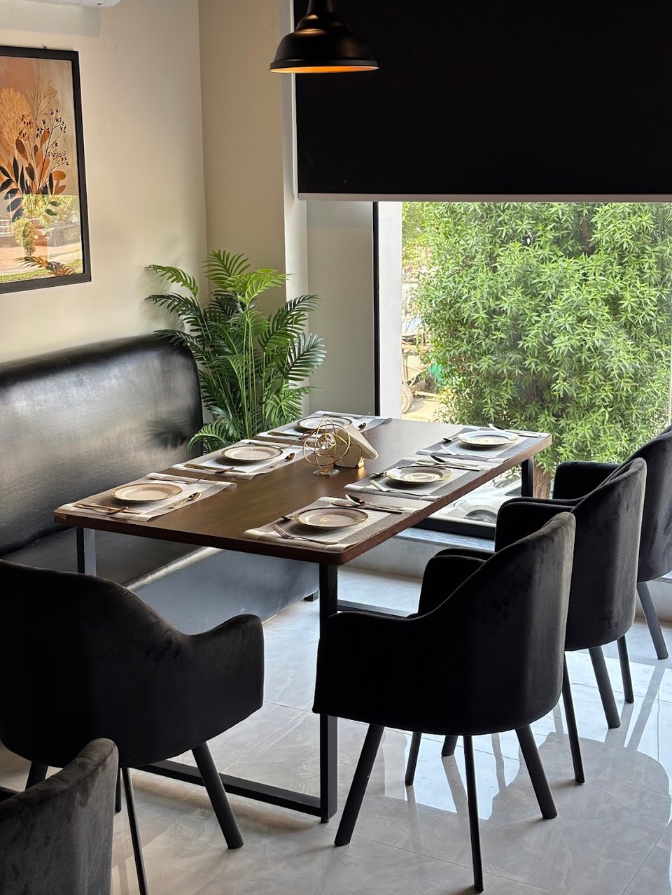 The window-side dining room at Olive Fork